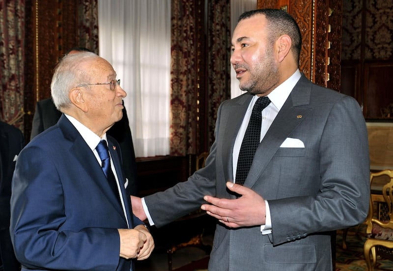 Essebsi, then Tunisia's Prime Minister, meets Morocco's king Mohammed VI in Rabat in 2011. AFP