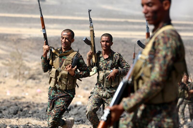 epa06416824 Yemeni soldiers participate in a military maneuver supported by the Saudi-led military coalition in the eastern province of Marib, Yemen, 04 January 2018. Since March 2015, the Saudi-led military coalition has been supporting pro-Yemeni government troops and carrying out airstrikes against the Houthi rebels in Yemen in an attempt to restore power to Yemen's internationally recognized President Abdo Rabbo Mansour Hadi.  EPA/SOLIMAN ALNOWAB