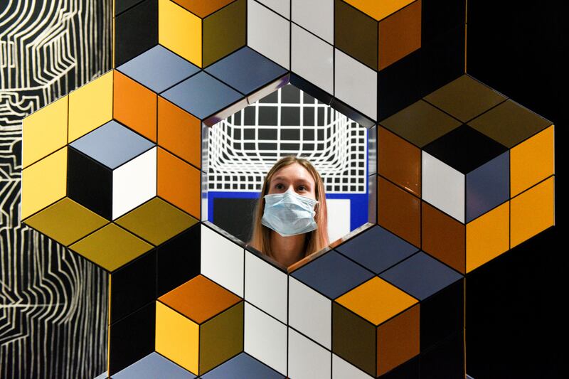 A retrospective of works by Victor Vasarely at Selfridges department store in London launched on Thursday. A number of the works by the Hungarian-French artist will go on sale and are expected to fetch more than £400,000. Getty Images