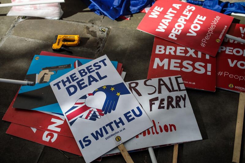 LONDON, ENGLAND - MARCH 11: Anti-Brexit placards lie  outside the House of Parliament on March 11, 2019 in London, England. Talks between the UK and the EU resume today before MPs in Parliament vote on British Prime Minister Theresa May's Brexit deal tomorrow. (Photo by Jack Taylor/Getty Images)