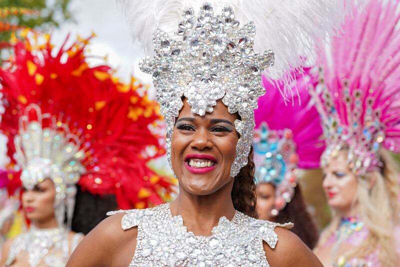 Revellers in colourful costumes take part in the carnival. Reuters