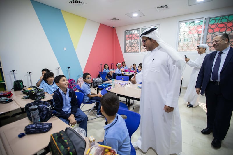 Ali Al Hosani, director of the Sharjah Private Education Authority, speaks to pupils at Sama American Private School.  Photos:  Ruel Pableo for The National