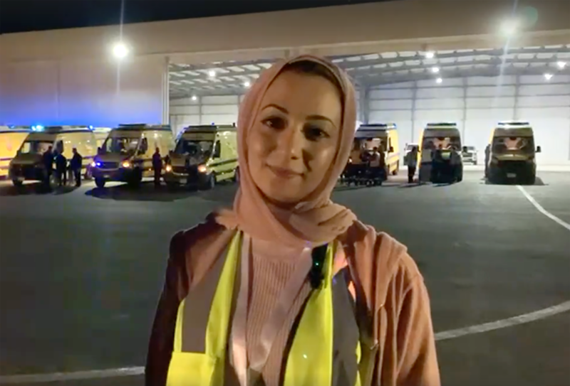 The National's Nada AlTaher at Al Arish military airport in Egypt. She was on board the flight that took Gazan cancer patients to the UAE Pawan Singh / The National