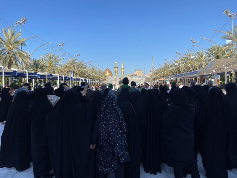 Women recite prayers at Imam Hussein Shrine