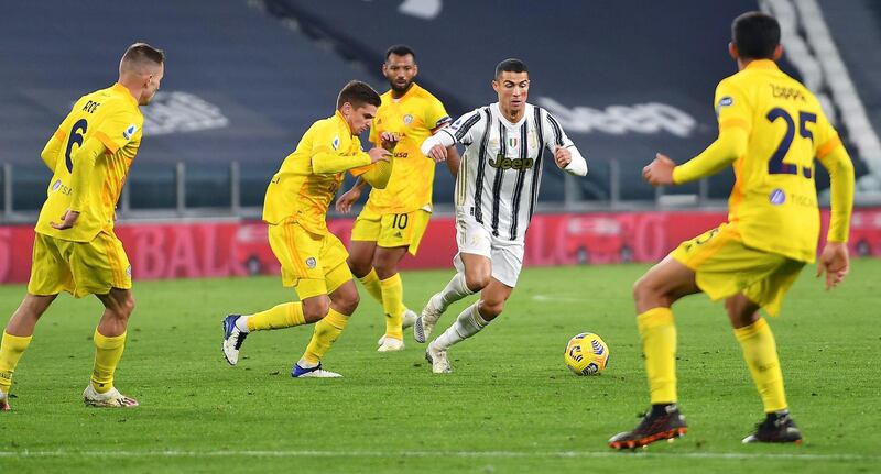 Ronaldo takes on the Cagliari defence. EPA