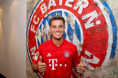 Brazilian midfielder Philippe Coutinho, new recruit of German first division Bundesliga football club FC Bayern Munich, poses in front of Bayern Munich's logo at the club's grounds in Munich, southern Germany, on August 18, 2019. Coutinho has joined Bayern Munich on a one-year loan worth 8.5 million euros ($9.5 million) with an option to buy, Spanish club Barcelona confirmed on August 19, 2019. - RESTRICTED TO EDITORIAL USE - MANDATORY CREDIT "AFP PHOTO / FC BAYERN MUNICH" - NO MARKETING NO ADVERTISING CAMPAIGNS - DISTRIBUTED AS A SERVICE TO CLIENTS / AFP / FC BAYERN MUNICH / HO / RESTRICTED TO EDITORIAL USE - MANDATORY CREDIT "AFP PHOTO / FC BAYERN MUNICH" - NO MARKETING NO ADVERTISING CAMPAIGNS - DISTRIBUTED AS A SERVICE TO CLIENTS