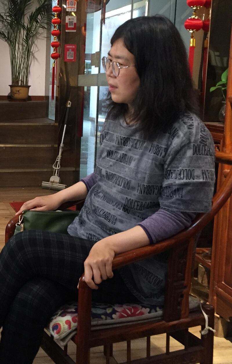 Citizen-journalist Zhang Zhan is seen in Wuhan, Hubei province, China in this handout picture taken on May 3, 2020.  Handout via REUTERS  ATTENTION EDITORS - THIS IMAGE WAS PROVIDED BY A THIRD PARTY. NO RESALES. NO ARCHIVES.