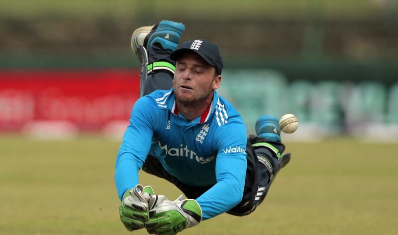 England’s wicketkeeper Jos Buttler drops a catch off Sri Lankan batsman Seekkuge Prasanna during the sixth one day international cricket match between Sri Lanka and England in Pallekele, Sri Lanka. Eranga Jayawardena / AP