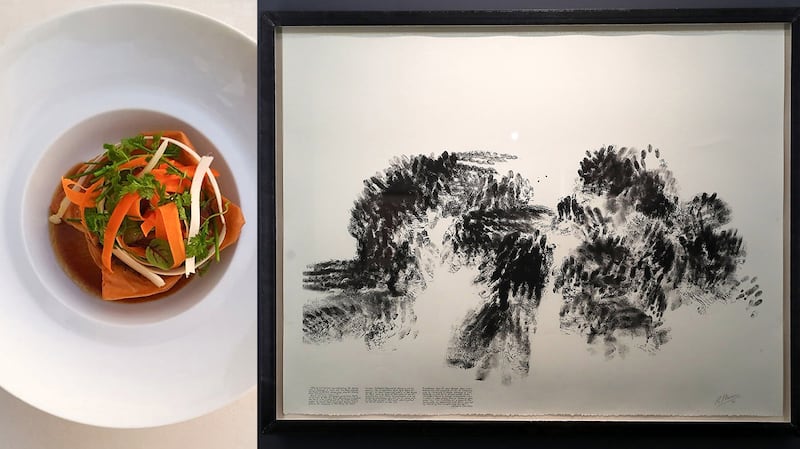 The dark meat stew and sauce of the pigeon pastilla, a dish that comes wrapped in sheets of filo, are reminiscent of Robert Moriss's multilayered artwork 'Blind Time IV (Drawing with Davidson)'. Photos: Fouquet's Abu Dhabi; Pawan Singh / The National 