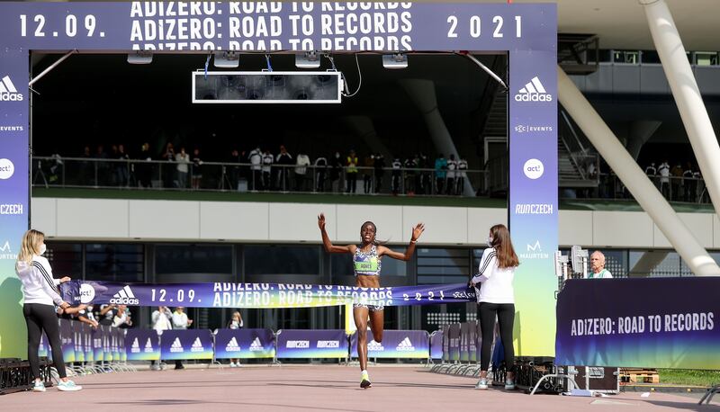 Agnes Tirop of Kenya wins the ADIZERO: ROAD TO RECORDS Women's 10km. Getty Images