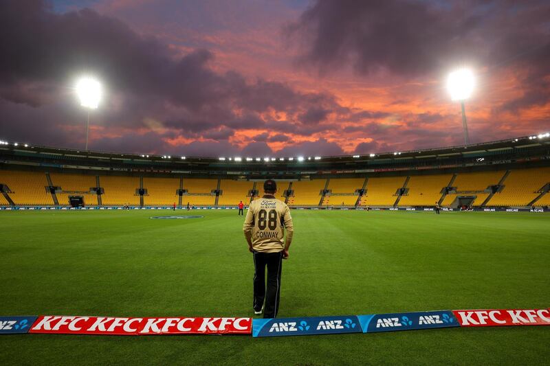 New Zealand's Devon Conway looks on as the sun sets during the T20 match agianst Australia at Sky Stadium in Wellington on Wednesday, March 3. Australia won the game by 64 runs. Getty