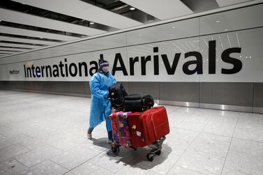 Travellers arrive at London Heathrow Airport as the government tightens entry requirements to stop imported cases of coronavirus. Getty Images 