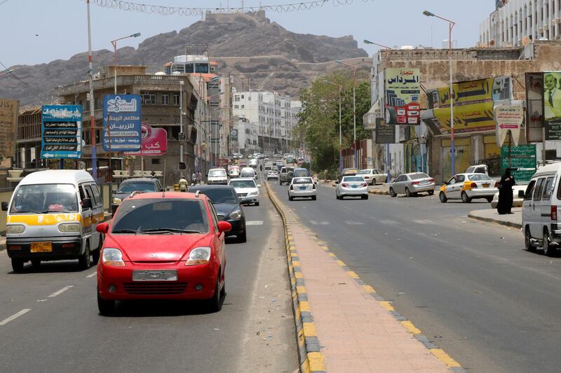 Yemenis drive down a street in Aden's Mualla region. AFP