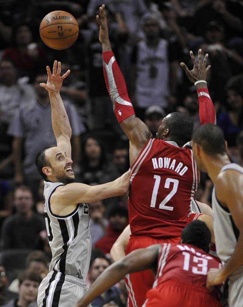Dwight Howard and the Rockets earned a key victory over San Antonio Spurs on Saturday. Darren Abate / AP