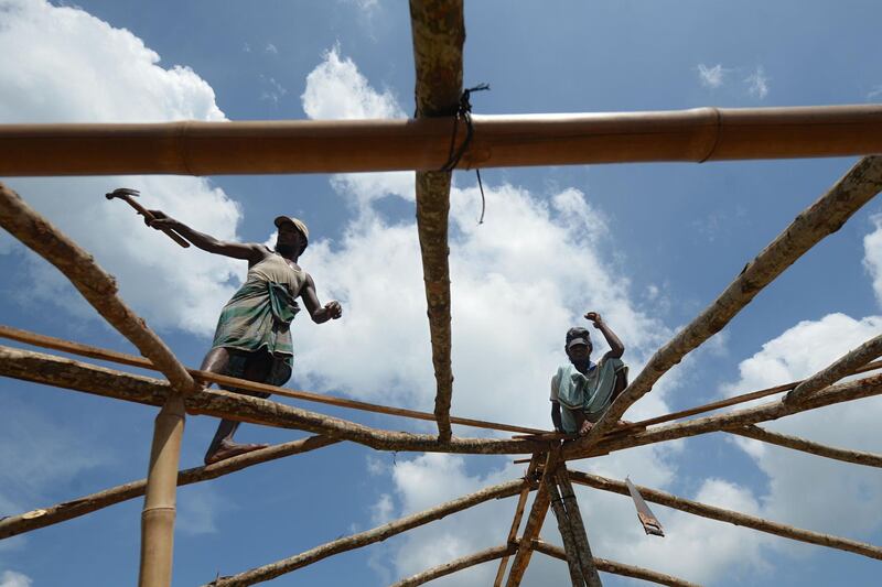 Rohingya refugees prepare to build a mosque in Kutupalong refugee camp. AFP