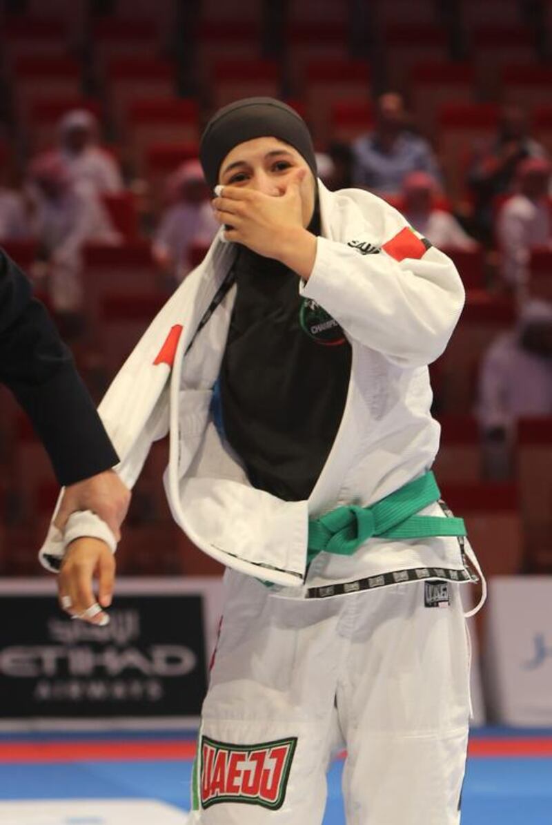 Mahra Al Hinaai of the UAE reacts after defeating Aneta Pokarna of the Czech Republic in the Abu Dhabi World Youth Jiu-Jitsu Championship 2016. Ravindranath / The National