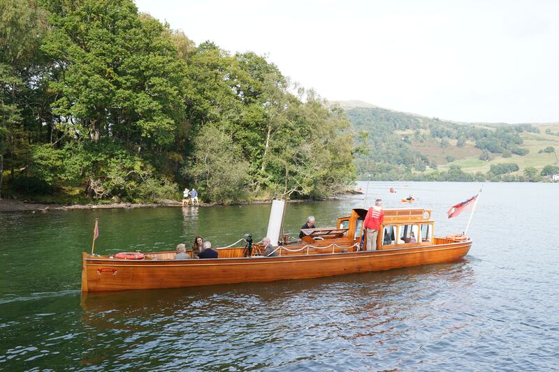Kate travels in the steam launch Osprey on Windermere. PA