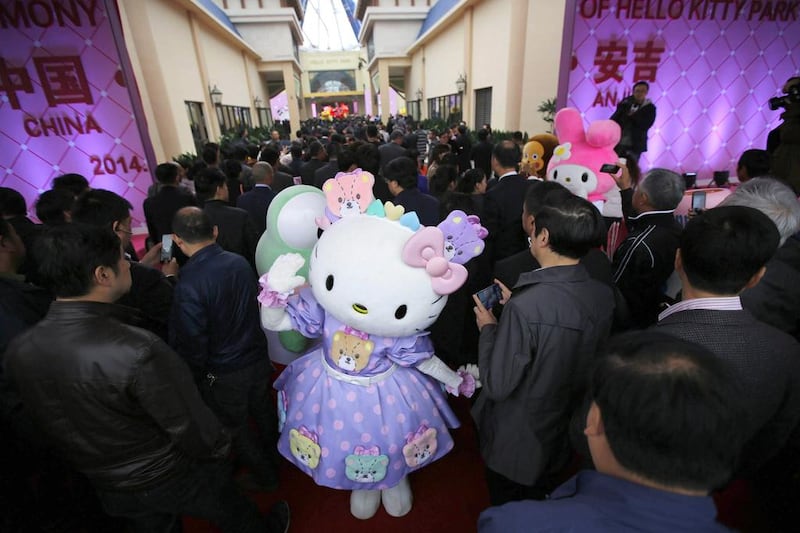 Sanrio characters greet guests during the inauguration ceremony of the Hello Kitty amusement park in Anji, Zhejiang province. Carlos Barria / Reuters