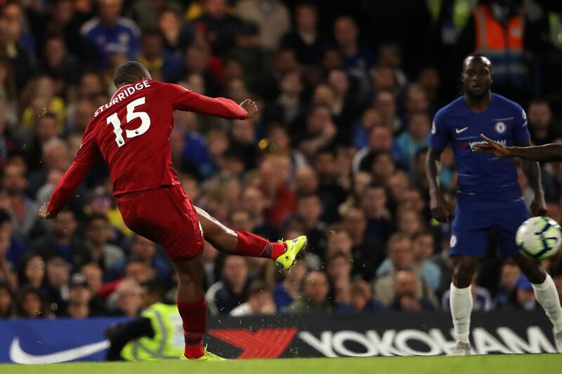 LONDON, ENGLAND - SEPTEMBER 29: Daniel Sturridge of Liverpool scores a goal to make it 1-1 during the Premier League match between Chelsea FC and Liverpool FC at Stamford Bridge on September 29, 2018 in London, United Kingdom. (Photo by Matthew Ashton - AMA/Getty Images)