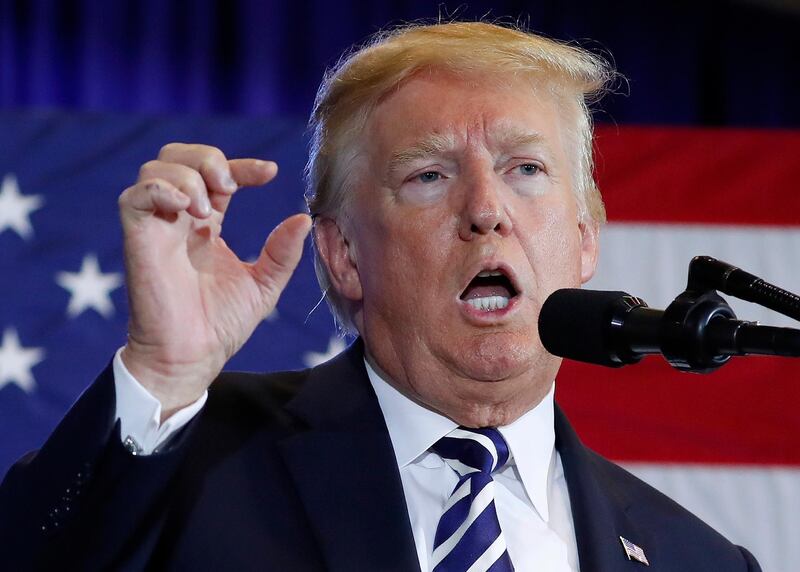 In this Aug. 31, 2018 photo, President Donald Trump gestures while speaking at the Harris Conference Center in Charlotte, N.C. President Donald Trump is escalating his attacks on Attorney General Jeff Sessions, suggesting the embattled official should have intervened in investigations of two GOP congressmen to help Republicans in the midterms. Trump tweeted Monday that â€œinvestigations of two very popular Republican Congressmen were brought to a well publicized charge, just ahead of the Mid-Terms, by the Jeff Sessions Justice Department.â€   (AP Photo/Pablo Martinez Monsivais)