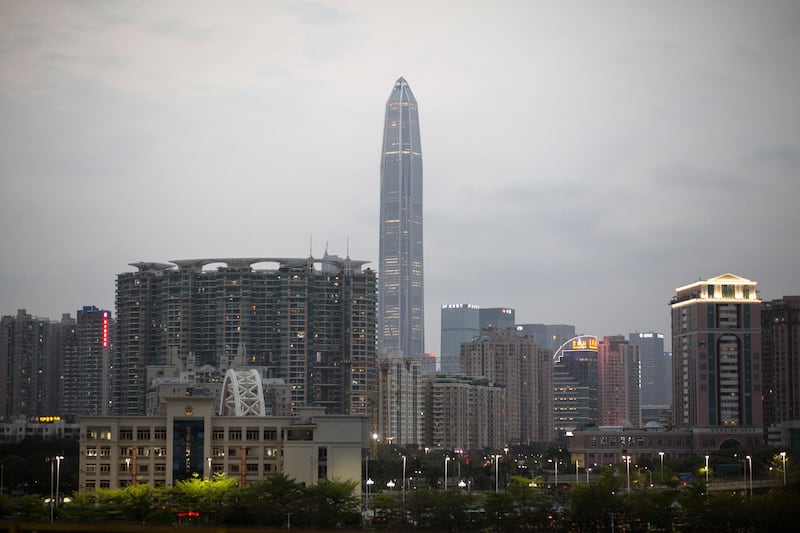 The Ping An Finance Centre rises above other buildings in Shenzhen, China. The building stands 599.1 metres, making it the fourth tallest building in the world but the world's tallest all office building. Jerome Favre / EPA