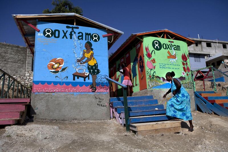 PORT-AU-PRINCE, HAITI - JANUARY 2011: A lartine project led and financed by Oxfam, at the tent camp where 55,000 displaced Haitians are living on the grounds of what was the Club de Petionville on January, 2011 in Port-au-Prince, Haiti.  (Photo by Jonathan Torgovnik/Getty Images) 



