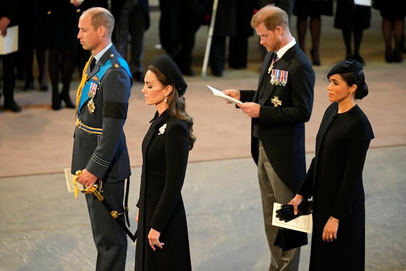 Prince William and Catherine with the Duke and Duchess of Sussex during the Lying-in-State of Queen Elizabeth in the Palace of Westminster in September 2022