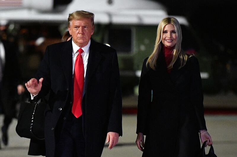 Donald Trump and daughter Ivanka Trump make their way to board Air Force One on January 4, 2021. AFP
