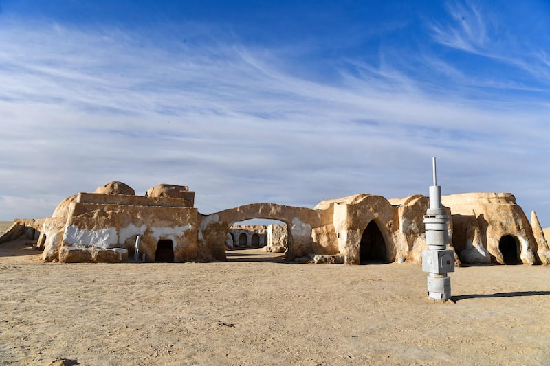 The fictional Mos Espa spaceport, seen in Episodes I, II, and III, was built at Ong Jemel, between two salt lakes north of the south-western Nefta oasis.