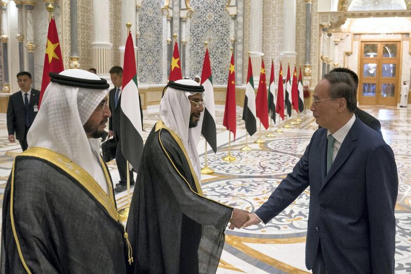 ABU DHABI, UNITED ARAB EMIRATES -October 29, 2018: HE Wang Qishan, Vice President of China (R) greets HH Sheikh Tahnoon bin Mohamed Al Nahyan, Ruler's Representative in Al Ain Region (2nd L), during a reception, at the Presidential Palace. Seen with HH Sheikh Hamdan bin Zayed Al Nahyan, Ruler���s Representative in Al Dhafra Region (L).
( Hamad Al Kaabi / Crown Prince Court - Abu Dhabi )
---