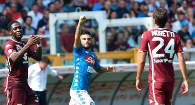 Napoli's Lorenzo Insigne celebrates after scoring during the Serie A soccer match between Torino and Napoli in Turin, Italy, Sunday, Sept. 23, 2018. (Alessandro Di Marco/ANSA via AP)