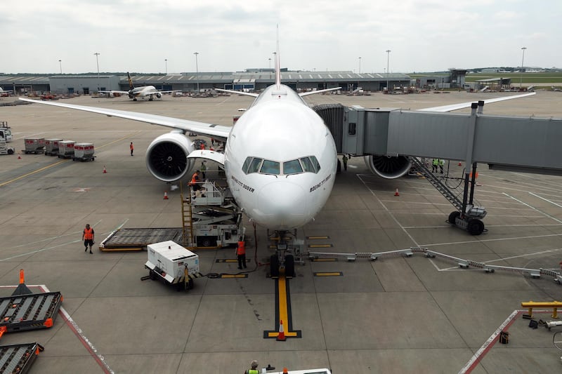 A Boeing Co. 777-300ER passenger jetliner, operated by Emirates Airline, sits parked at its gate at London Stansted Airport in Stansted, U.K., on Friday, June 8, 2018. The arrival of the jetliner should kick off a new phase of growth for the terminal 35 miles north of London, according to London Stansted Airport Chief Executive Officer Ken O'Toole. Photographer: Chris Ratcliffe/Bloomberg