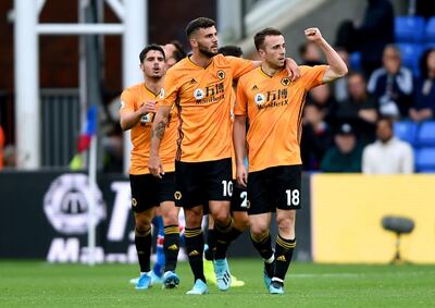 Wolverhampton Wanderers' Diogo Jota (right) celebrates scoring his side's first goal of the game with his team mates during the Premier League match at Selhurst Park, London. PA Photo. Picture date: Sunday September 22, 2019. See PA story SOCCER Palace. Photo credit should read: Daniel Hambury/PA Wire. RESTRICTIONS: EDITORIAL USE ONLY No use with unauthorised audio, video, data, fixture lists, club/league logos or "live" services. Online in-match use limited to 120 images, no video emulation. No use in betting, games or single club/league/player publications.