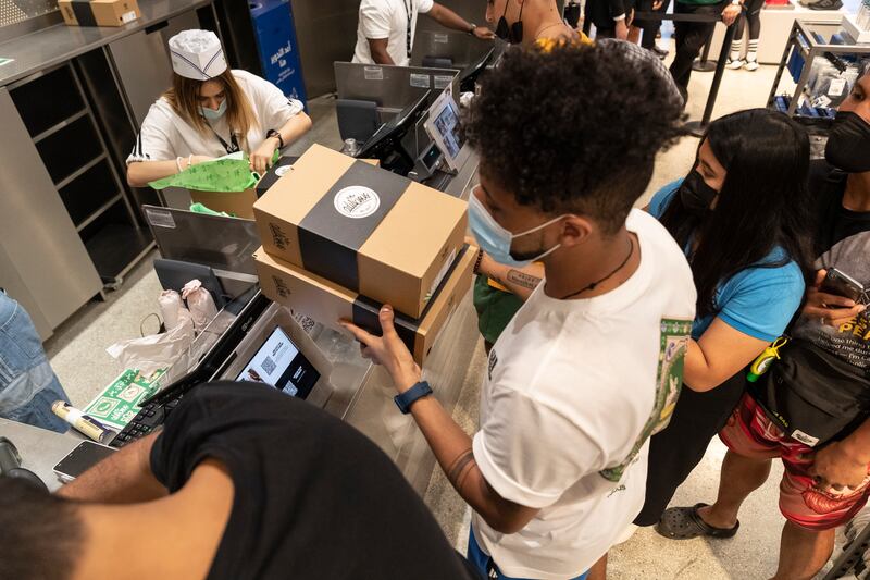 The Adidas x Ravi Restaurant trainers launch day in The Dubai Mall. Antonie Robertson / The National
