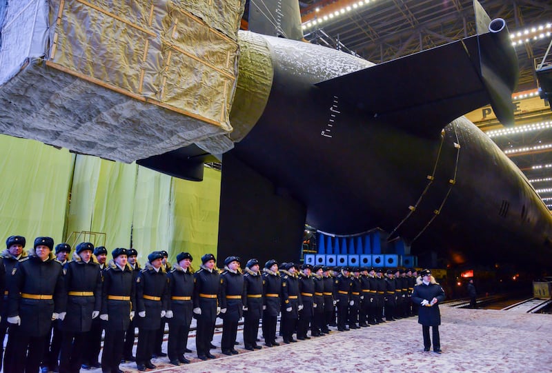Russian servicemen line up for a roll-out ceremony held in honour of Generalissimus Suvorov, under the second Project 955A Borei-A nuclear-powered ballistic missile submarine, at the Sevmash shipyard in Severodvinsk. Getty Images

THIS IMAGE WAS PROVIDED BY A THIRD PARTY. EDITORIAL USE ONLY (Photo by Sevmash Press Office\TASS via Getty Images)