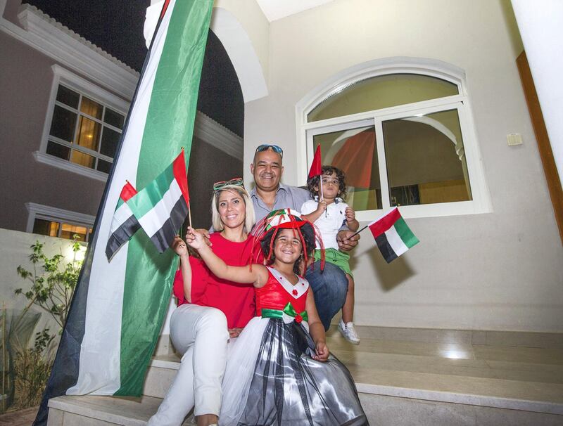 DUBAI, UNITED ARAB EMIRATES- Hayder Al Zuhairi with his family celebrating the UAE flag day at their villa.  Leslie Pableo for The National for Patrick Ryan’s story