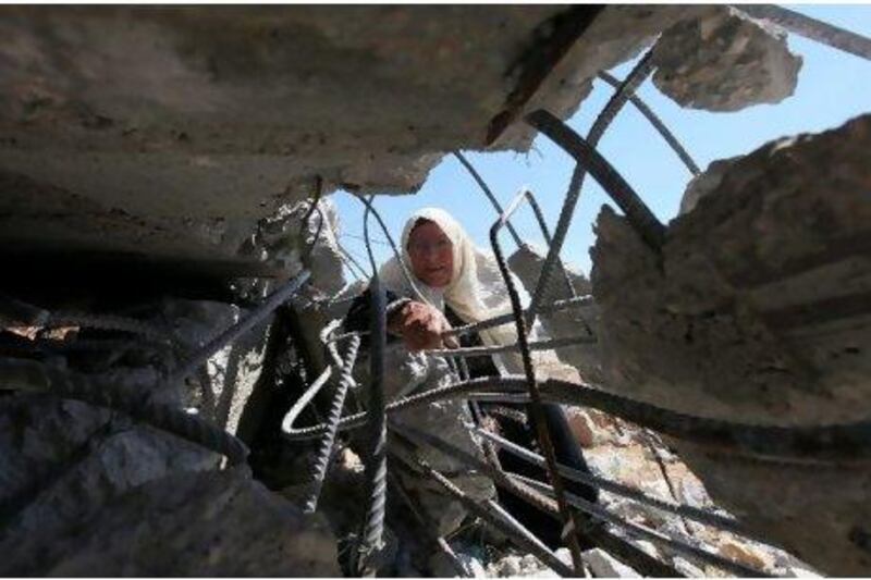 The rubble of a house after it was demolished by Israeli army machinery in the West Bank village of Beit Omar, near Hebron, yesterday. Abed Al Haslamoun / EPA