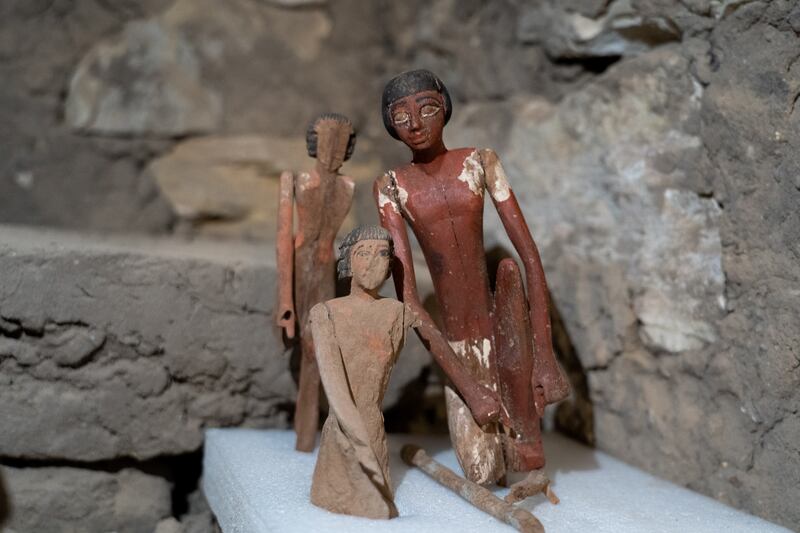 Wooden statues found inside the tomb of Pepi Nefhany who was the supervisor of the great house, at the Saqqara area, in Giza. Mahmoud Nasr / The National
