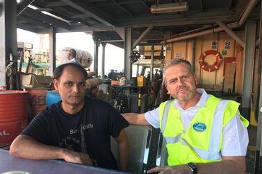 Vikash Mishra, left, with Rev Andy Bowerman of the Mission to Seafarers, a charity supporting abandoned crew in Dubai. Courtesy Mission to Seafarers