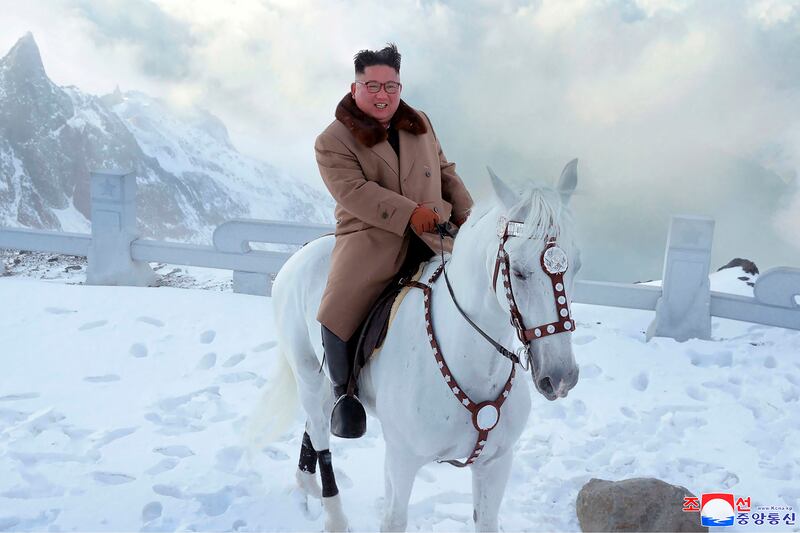 Kim Jong-un rides a horse to climb Mount Paektu in North Korea in October 2019. KCNA / AP