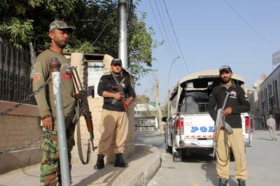 Pakistani security officials stand guard at a checkpoint in Quetta, Balochistan. EPA