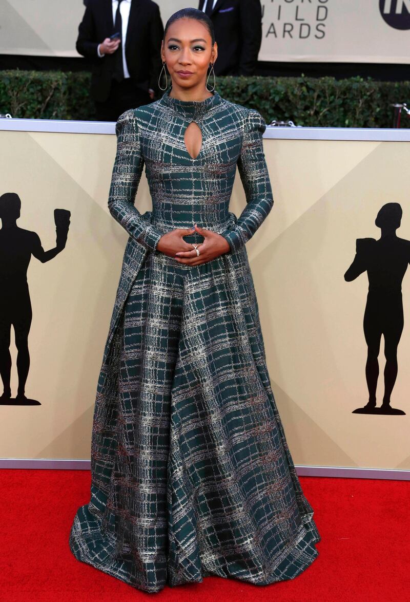 We absolutely adore Get Out star Betty Gabriel's unique Phuong My dress. We certainly didn't expect we'd love a tartan-style dress this much. Mike Nelson / EPA