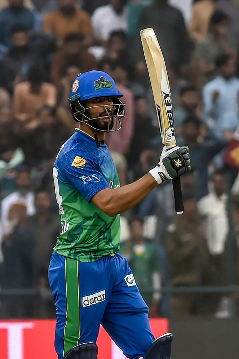 Multan Sultans' team captain Shan Masood celebrates after scoring a half century (50 runs) during the Pakistan Super League (PSL) T20 cricket match between Karachi Kings and Multan Sultans at the Multan Cricket Stadium in Multan on February 28, 2020. (Photo by Arif ALI / AFP)