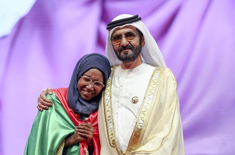 Sheikh Mohammed with Hadeel Anwar, winner of the 2018 Arab Reading Challenge. Photo: Wam 