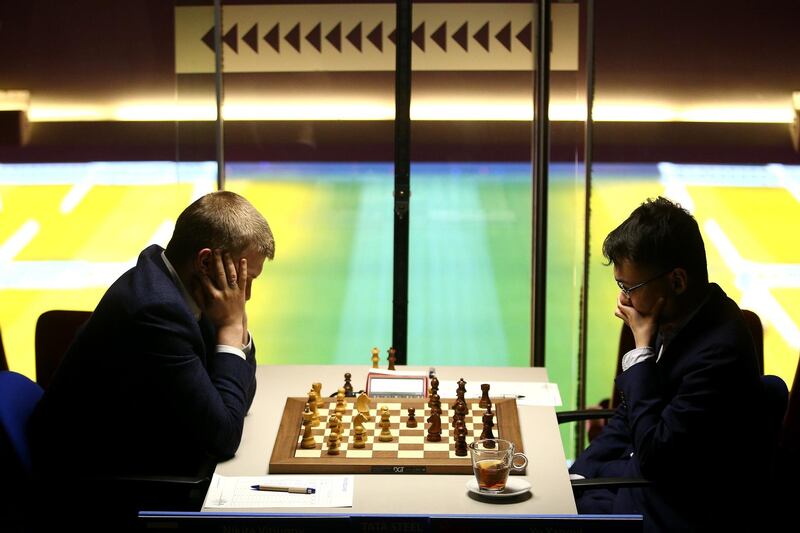 Yu Yangyi, right, of China competes against Russia's Nikita Vitiugov during the 82nd Tata Steel Chess Tournament held at, Philips Stadion, the home of Dutch football club PSV Eindhoven, on Thursday, January 16. Getty