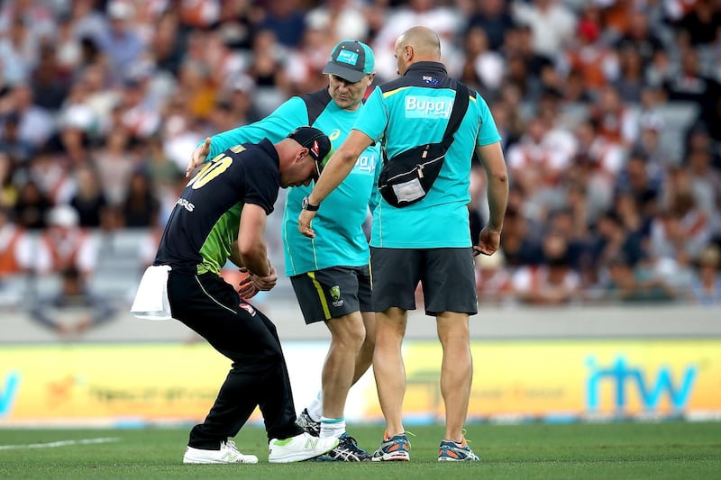 AUCKLAND, NEW ZEALAND - FEBRUARY 21:  Chris Lynn of Australia leaves the field injured during the International Twenty20 Tri Series Final match between New Zealand and Australia at Eden Park on February 21, 2018 in Auckland, New Zealand.  (Photo by Phil Walter/Getty Images)