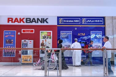 Many UAE banks have introduced new financial relief measures amid the coronavirus outbreak in line with the central bank's Dh100 billion economic stimulus package. Victor Besa / The National