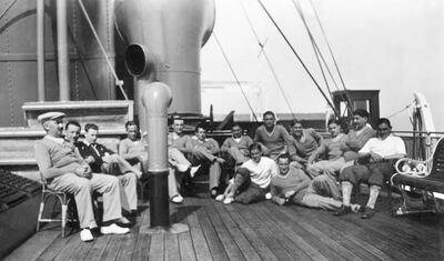 French footballers pose after lunch for a group picture during their cruise aboard the Conte Verde in July 1930 on their way to Uruguay to participate in the first World Cup. Photo: AFP