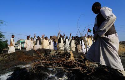 Sudanese people from the eastern Beja region block the main road of Port Sudan in protest against parts of  the Juba Peace Agreement between rebel groups and the government. AFP