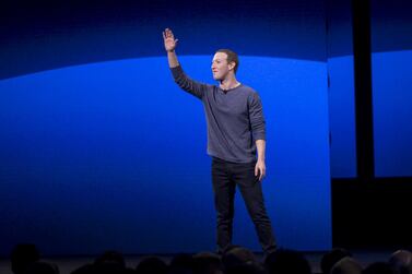 Mark Zuckerberg waves to attendees after speaking during the F8 Developers Conference where he unveiled Facebook's new features and developments. Bloomberg